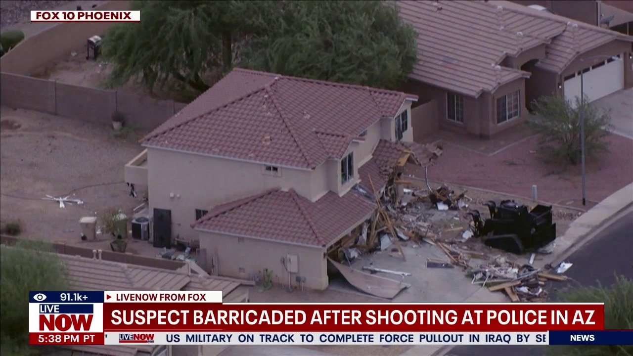 Suspect barricaded after shooting at police in AZ