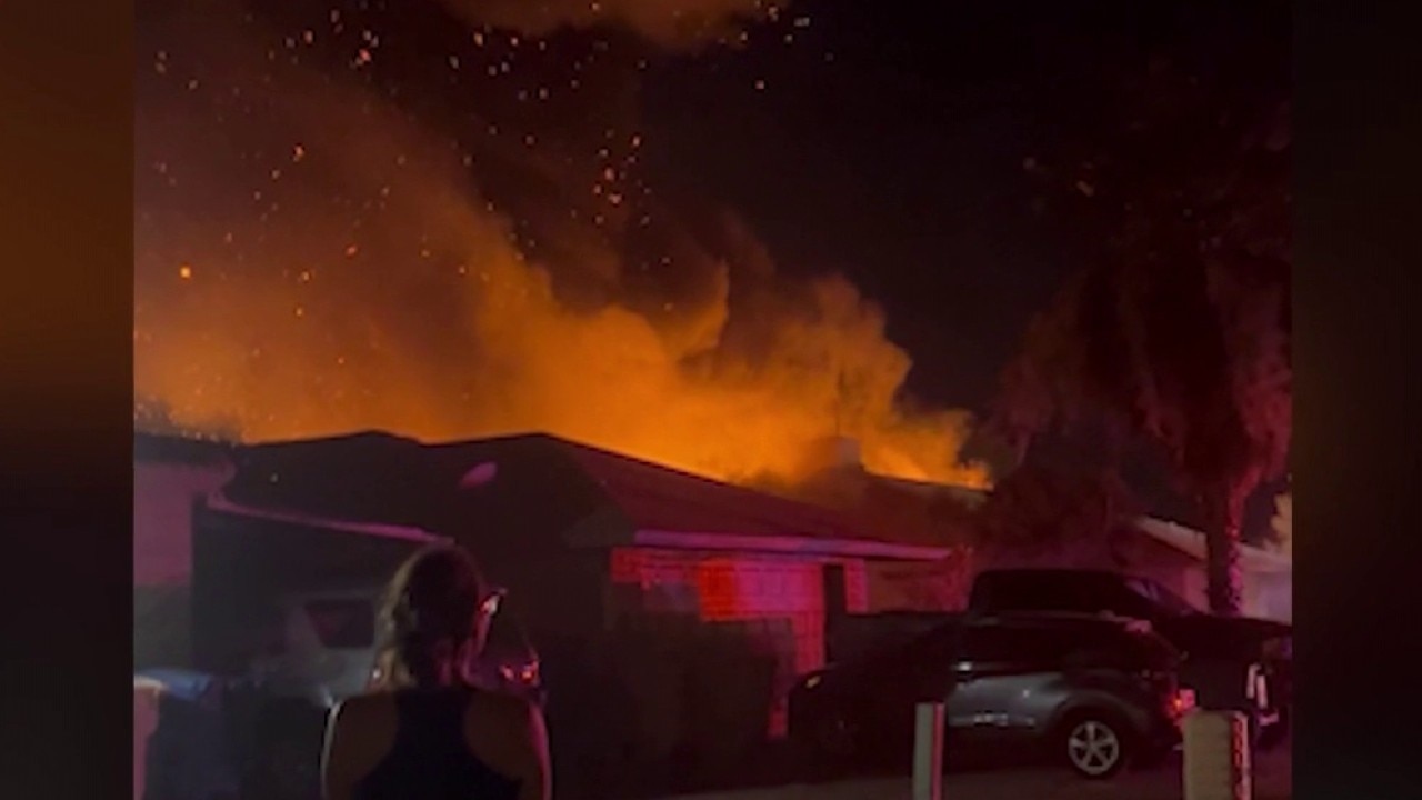 Neighbors try to put out flames in deadly Glendale house fire