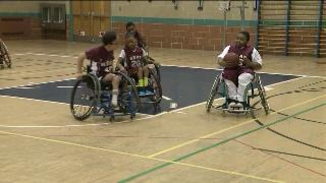 Chip checks out Adaptive Sports Basketball program through Independence First