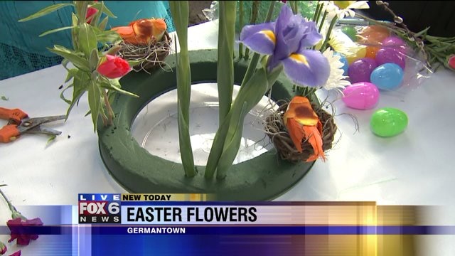 Laura helps arrange Easter centerpieces