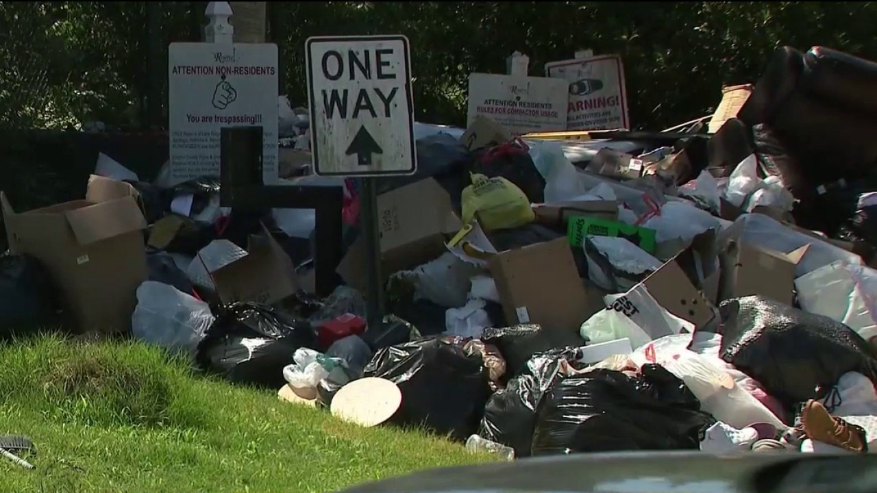 Broken trash compactor leaves Clayton County neighborhood buried in waste