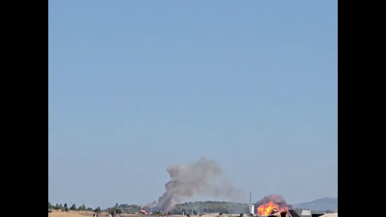 Shocking moment fighter jet crashes at Greek airshow