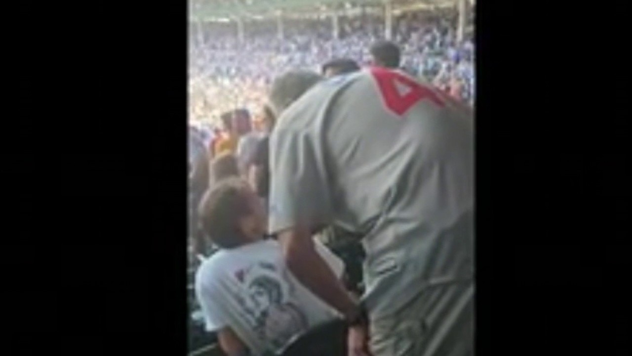 Video of Cubs fan smacking another during national anthem goes viral
