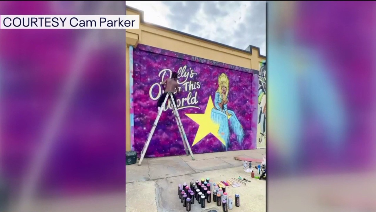 Artist honors Dolly Parton with mural