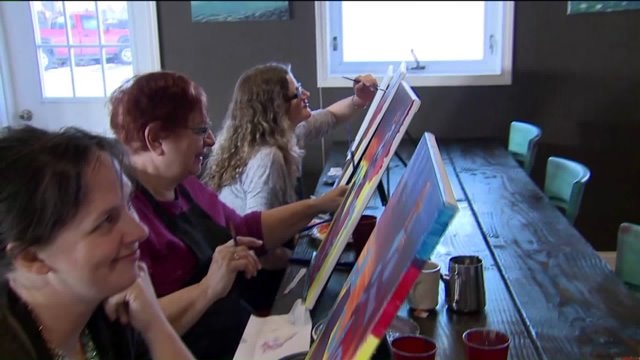 Kramp talks with art teachers at Farmhouse Paint & Sip