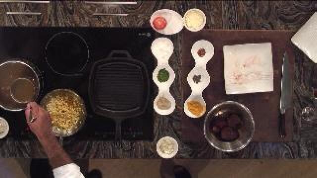 Chef Feker prepares grilled black Angus beef appetizer