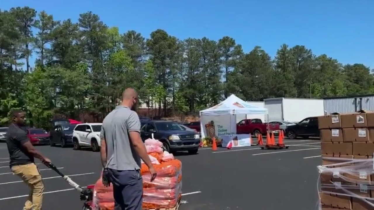 Drive-up food distribution serves 250 Jonesboro families