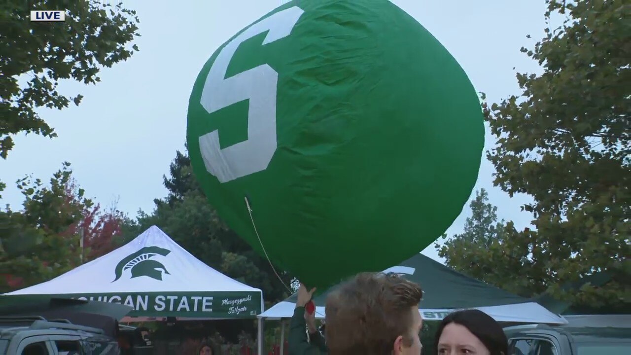Tailgaters show up early in East Lansing