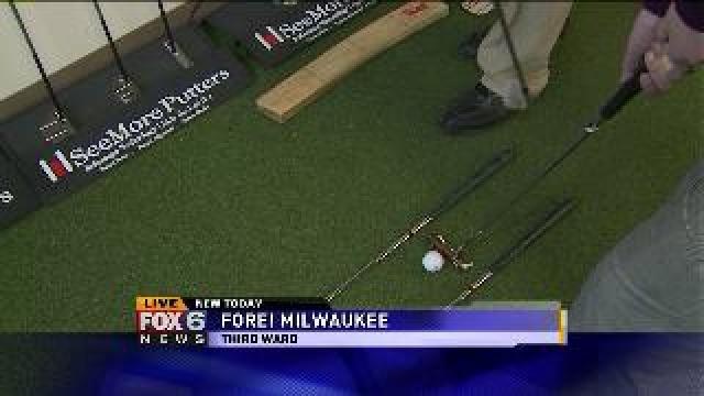 Laura learns about golf at Fore! Milwaukee