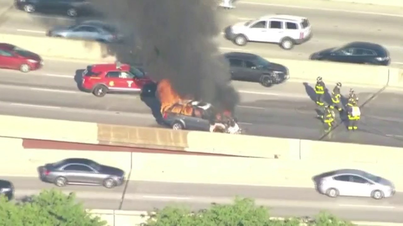 SUV fully engulfed in flames on Dan Ryan during morning rush