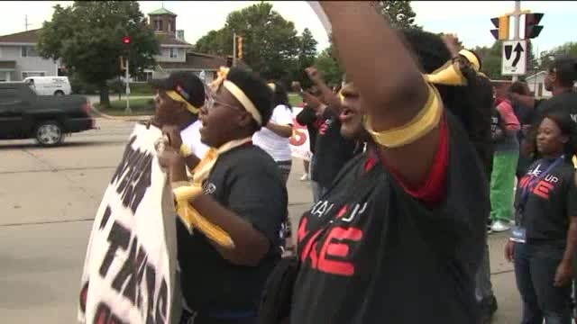 Minimum wage protests creat financial headache for business nearby