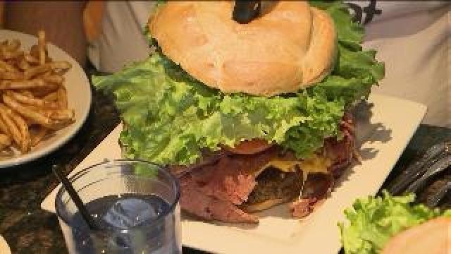 Tony witnesses Awesome Fat attempt to down a giant burger