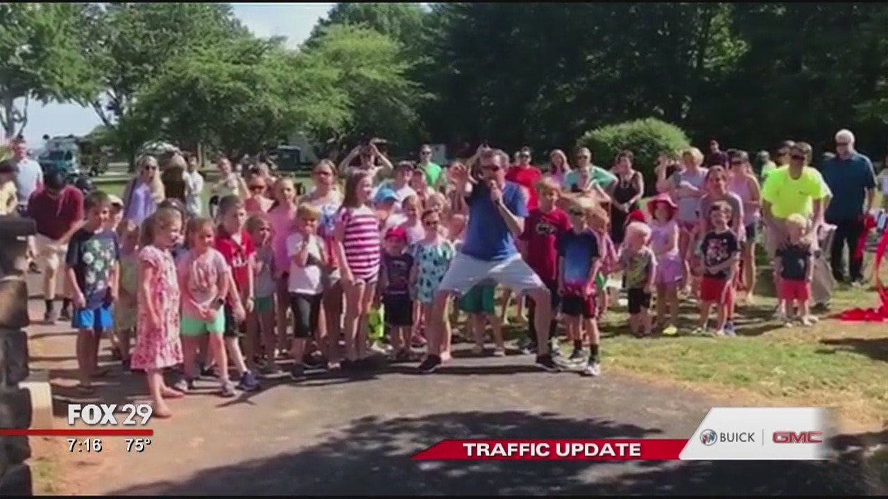 Bob Kelly helps reopen East Goshen Township playground