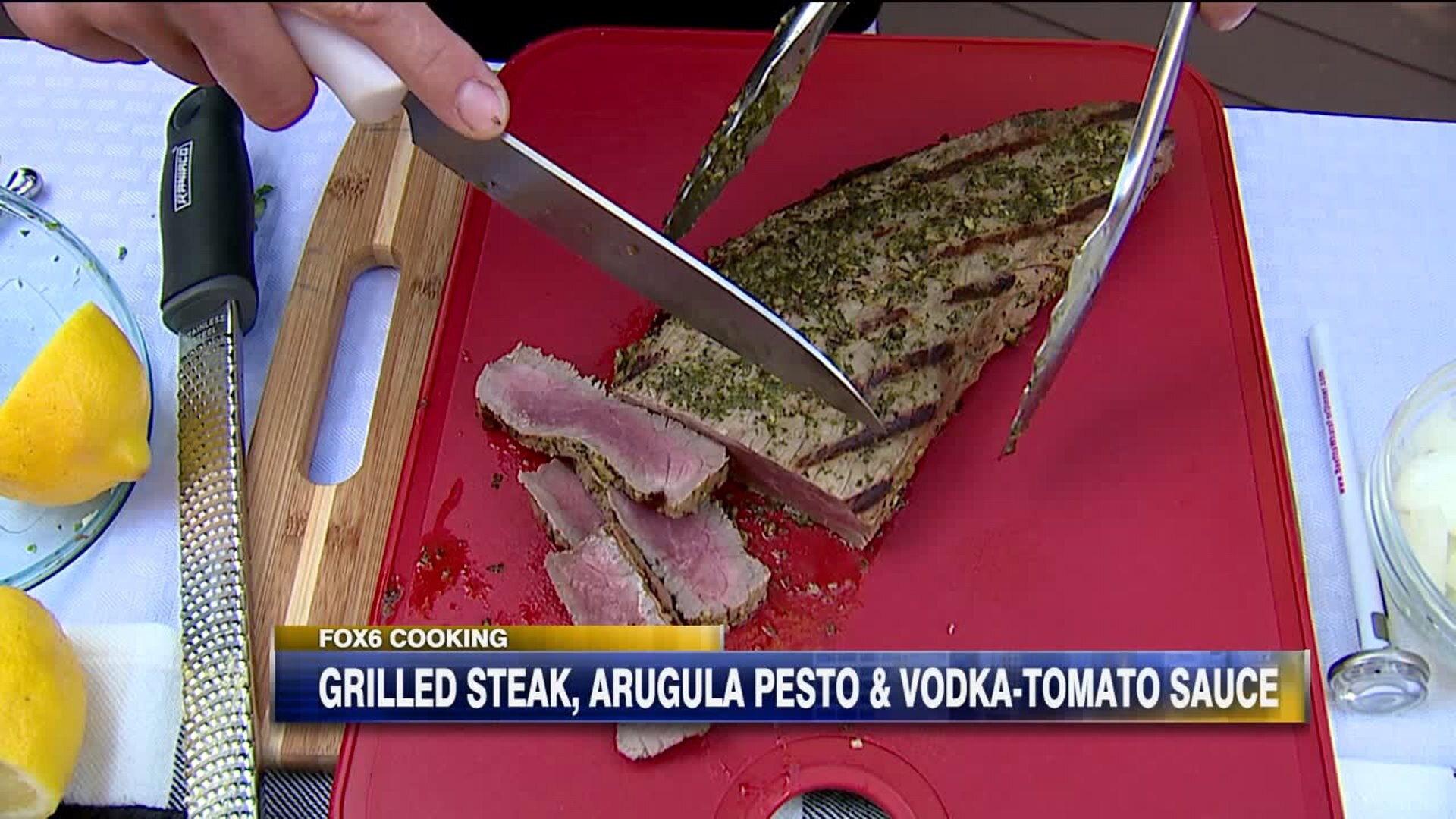 Grilled steak with arugula pesto and vodka-tomato sauce