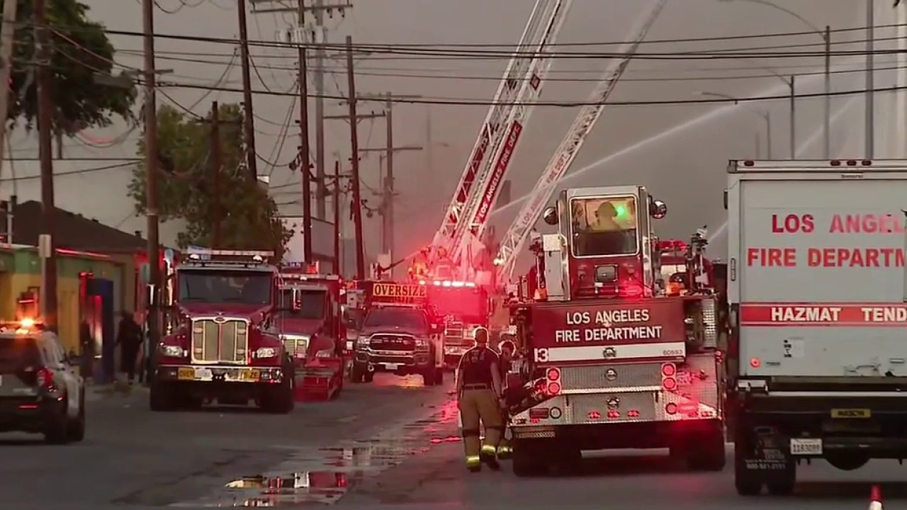 Crews continue to battle dangerous warehouse fire
