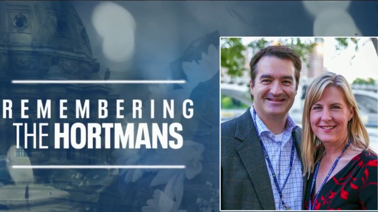 Flags flying at half-staff to honor the Hortmans