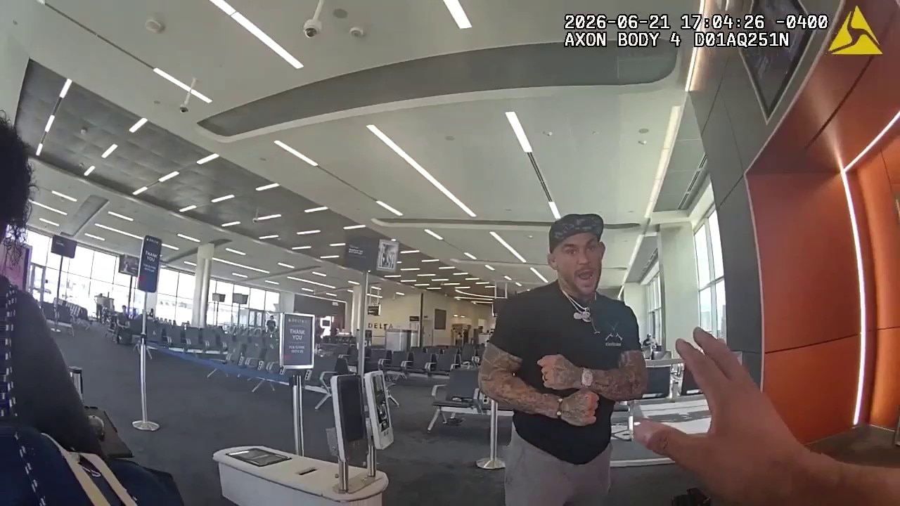 Body camera shows Dustin Poirier's arrest at airport
