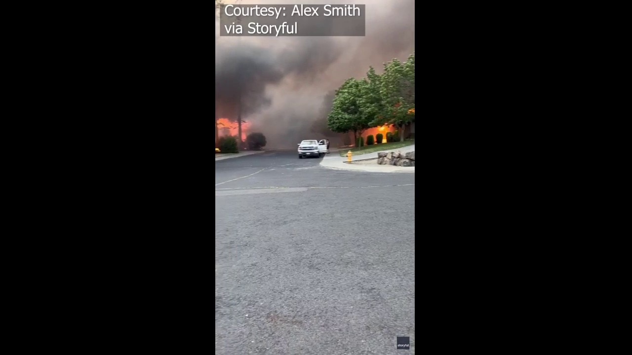 Spokane homeowner watches home burn down (WARNING: Contains profanity)