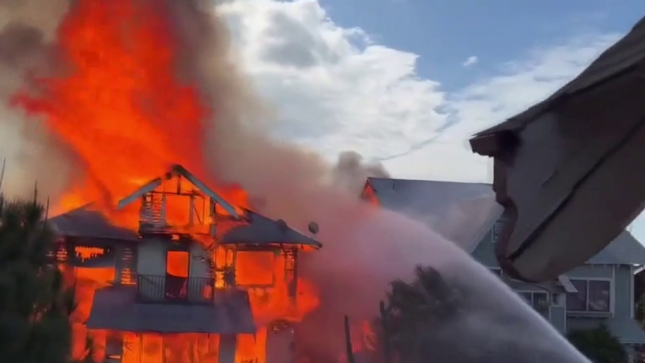 House fire forces residents to jump from windows