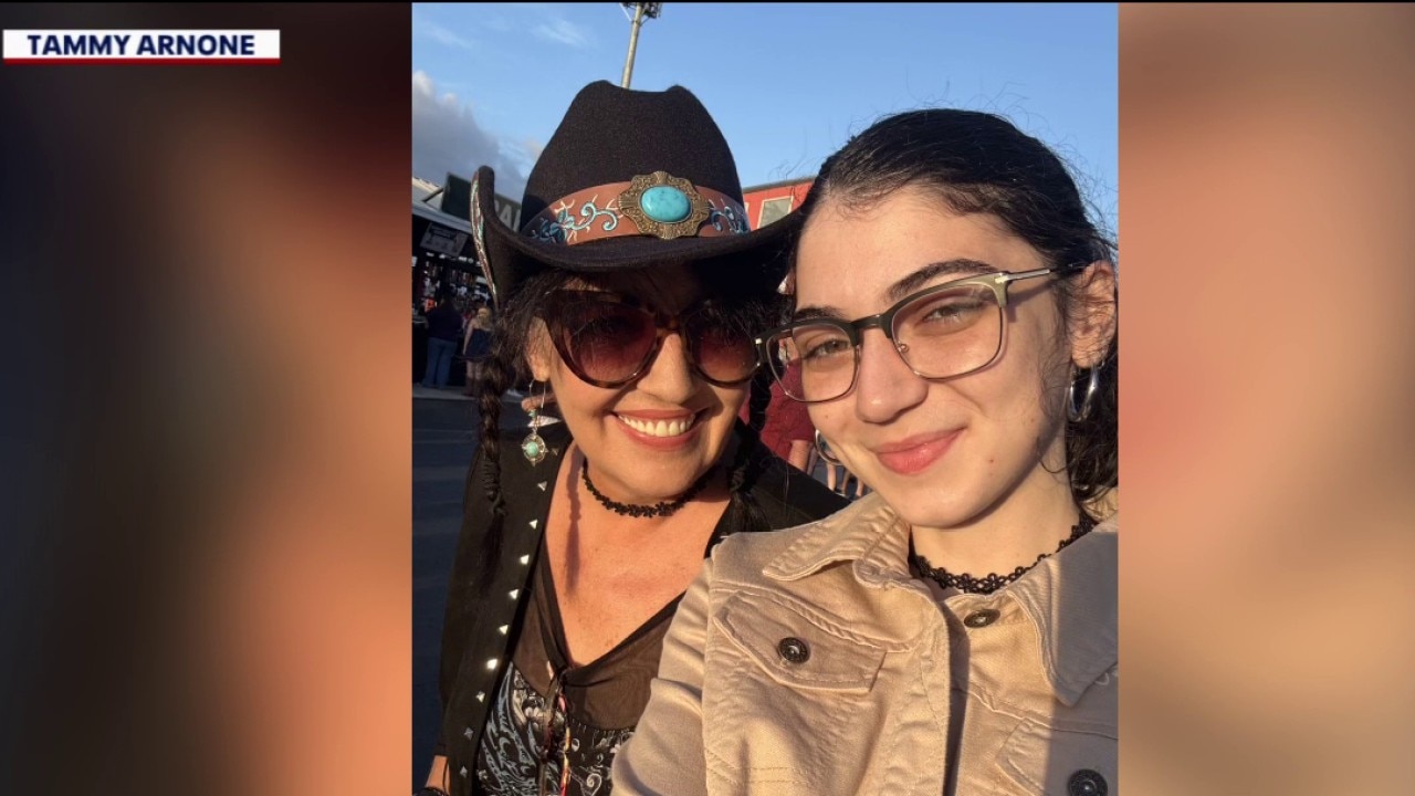 Woman celebrates weight loss after surgery