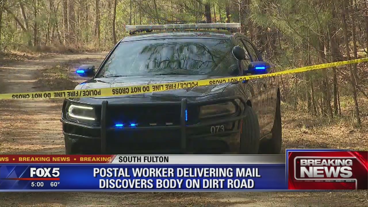 Postal worker finds body