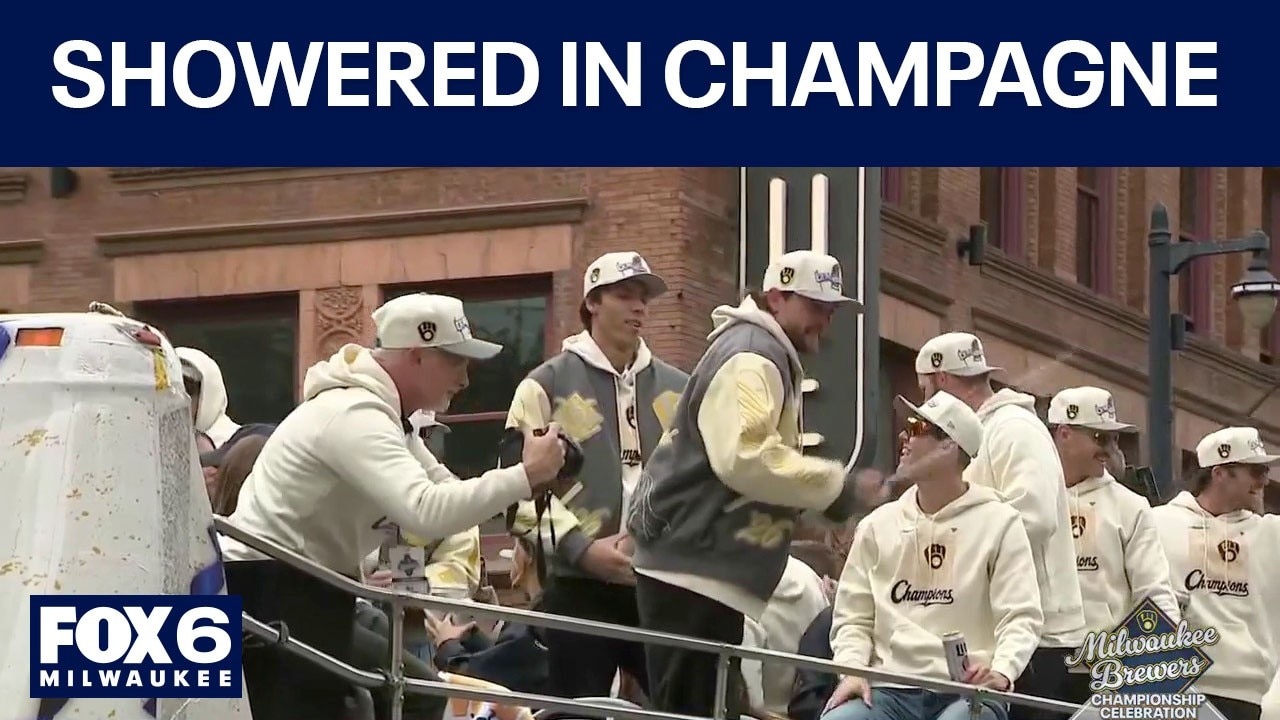 Milwaukee Brewers shower fans in champagne at championship parade