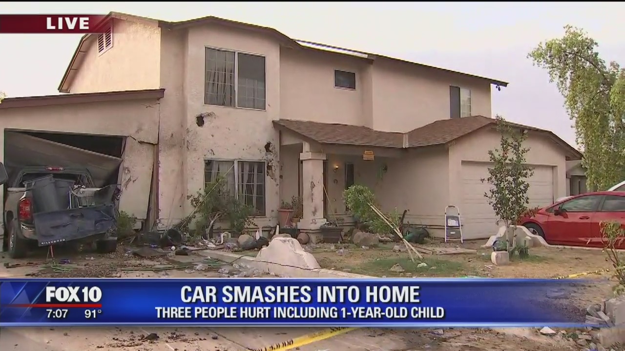 Car crashes into home, 3 hurt, driver detained