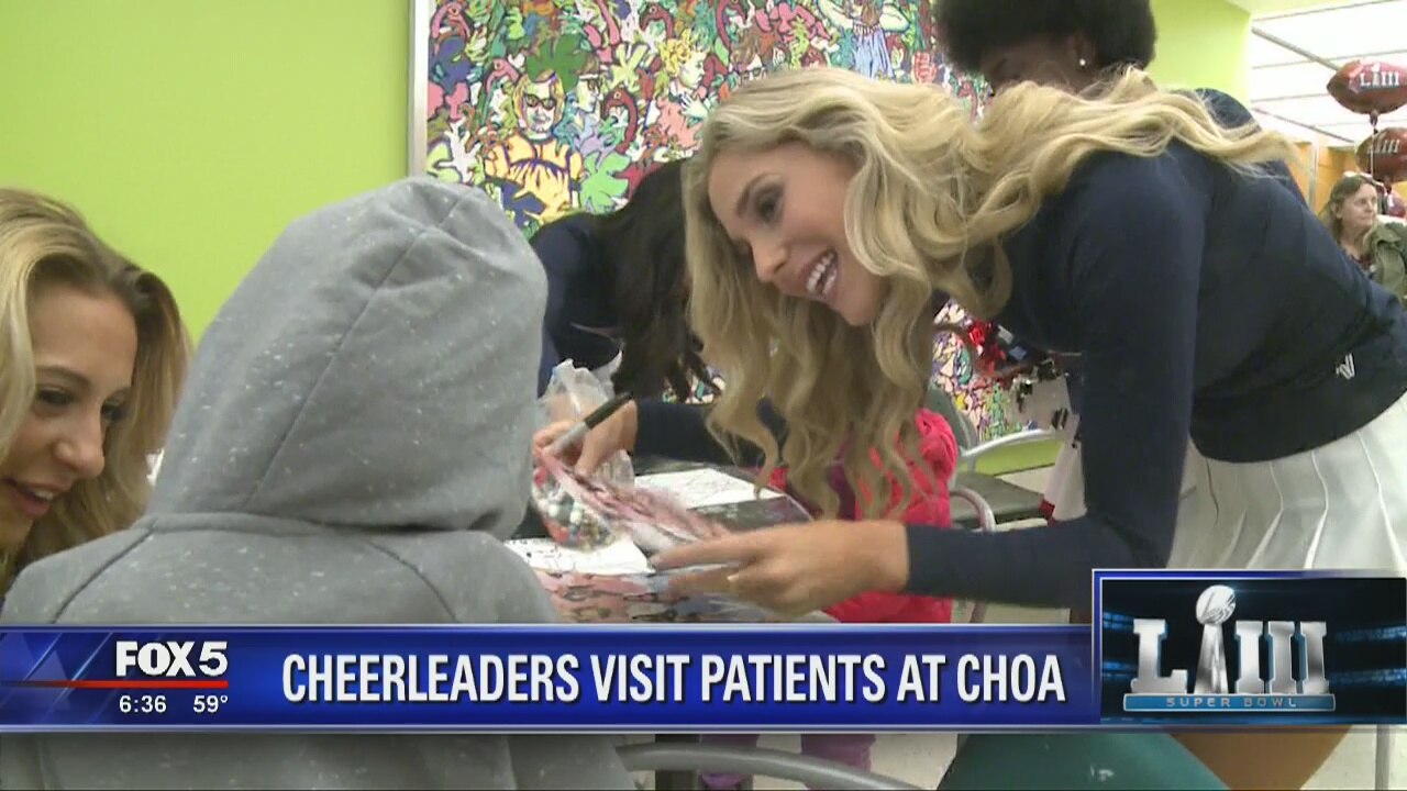 Cheerleaders visit patients at CHOA