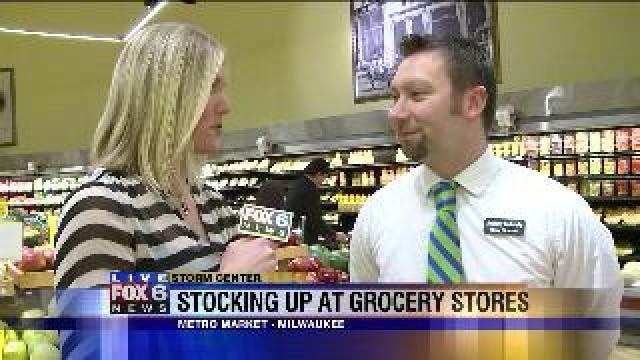 Laura hands out hot chocolate at Metro Market