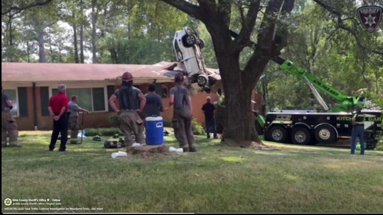 Vehicle crashes into Macon home rooftop