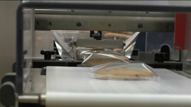 Chip sees how cookies are decorated, packaged