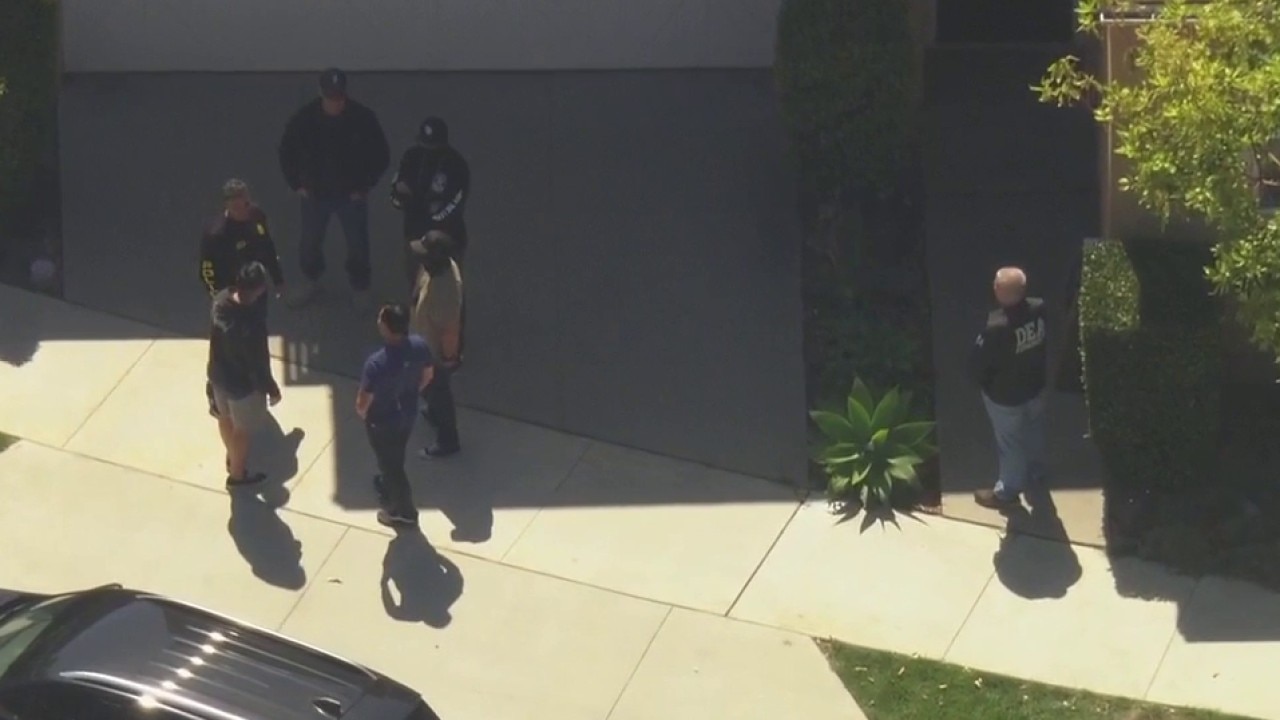 DEA serving search warrants in Tustin