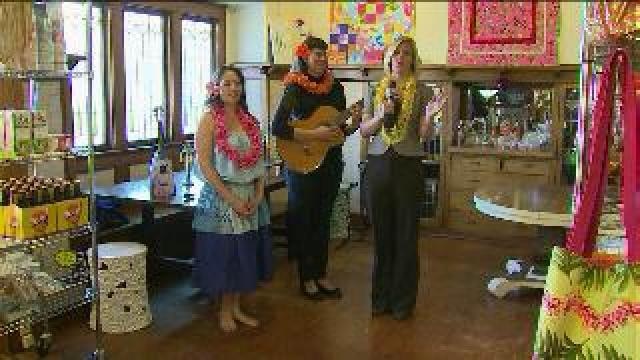 Laura enjoys some Hawaiian dance and music