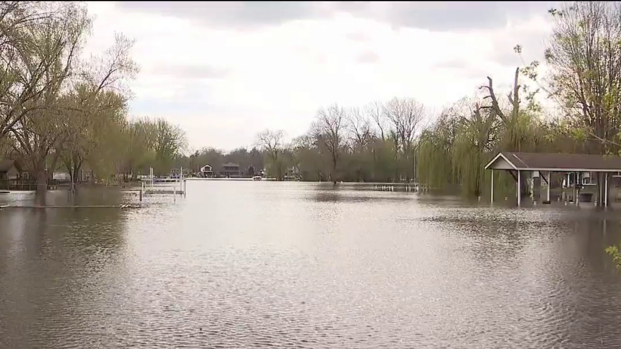 Floodwaters swamp Port Barrington streets as Fox River nears crest