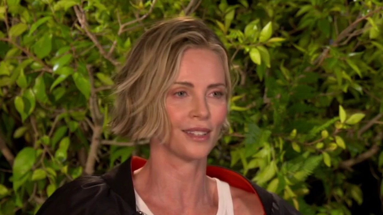 Andrew Freund sits down with Charlize Theron and Taron Egerton to discuss their new thriller "Apex."