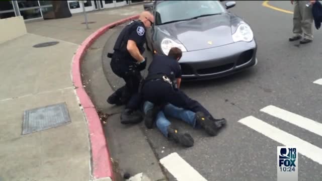 Officers arrest man smashing dozens of car windows along Seattle street, including many at Q13 FOX