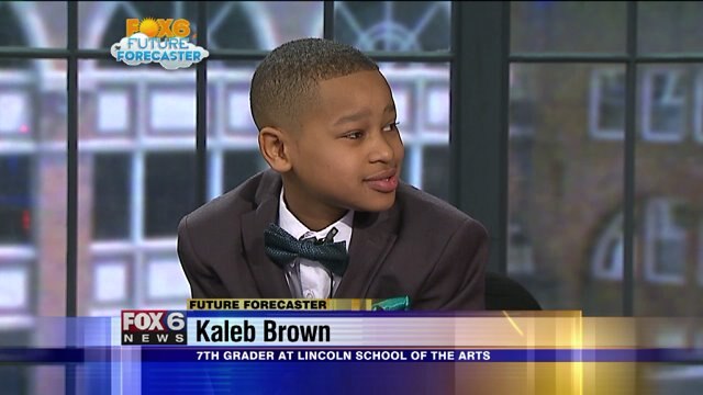 Kaleb Brown helps FOX6 Meteorologist Stephanie Barichello with the weather