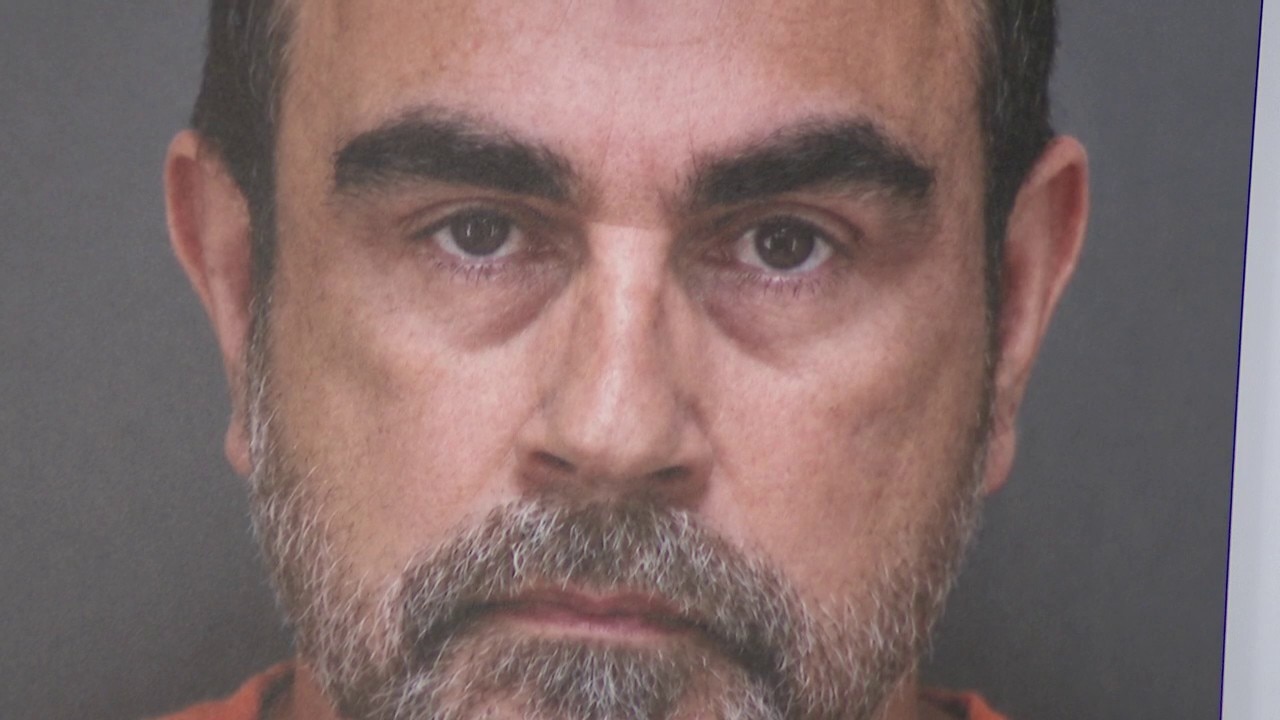 Adoptive father arrested on child porn charges