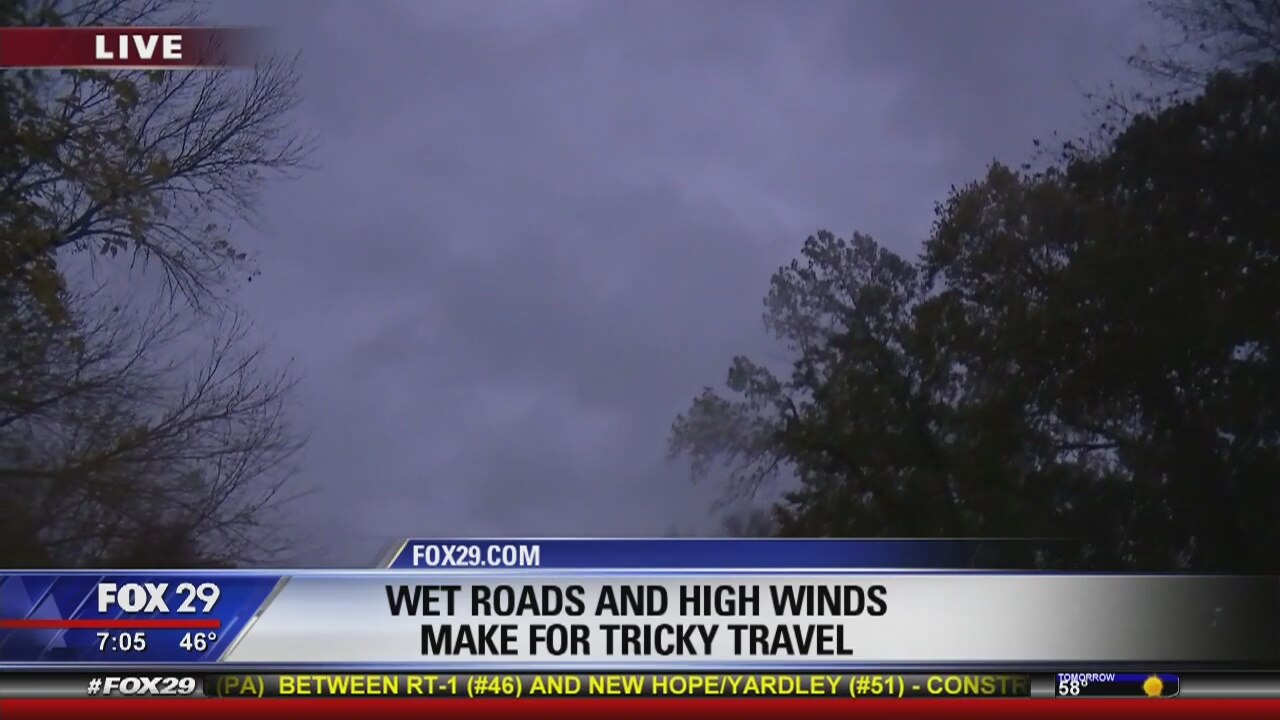 Wet roads and high winds make for tricky travel Monday morning