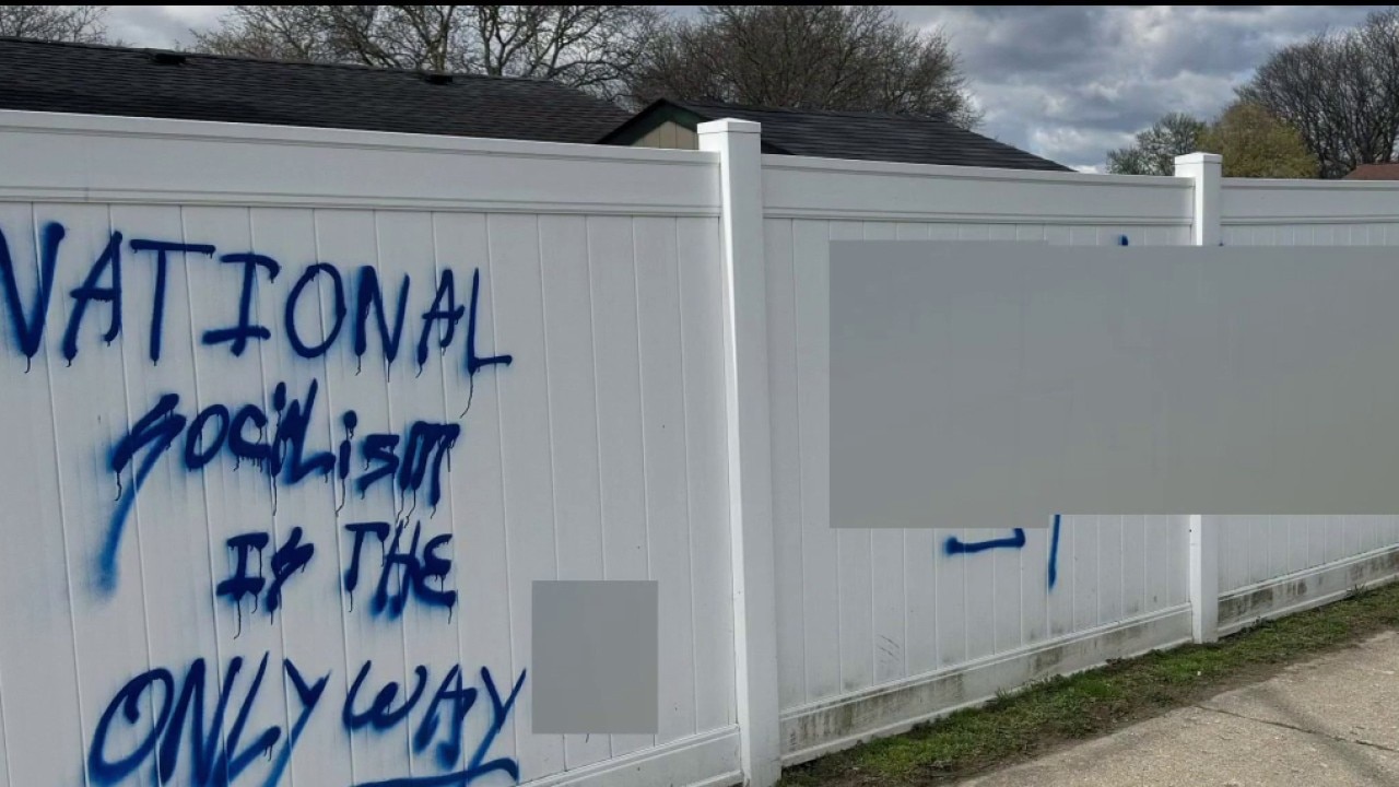 Two arrested in Sterling Heights after swastikas, bias-motivated graffiti found on fence, police say