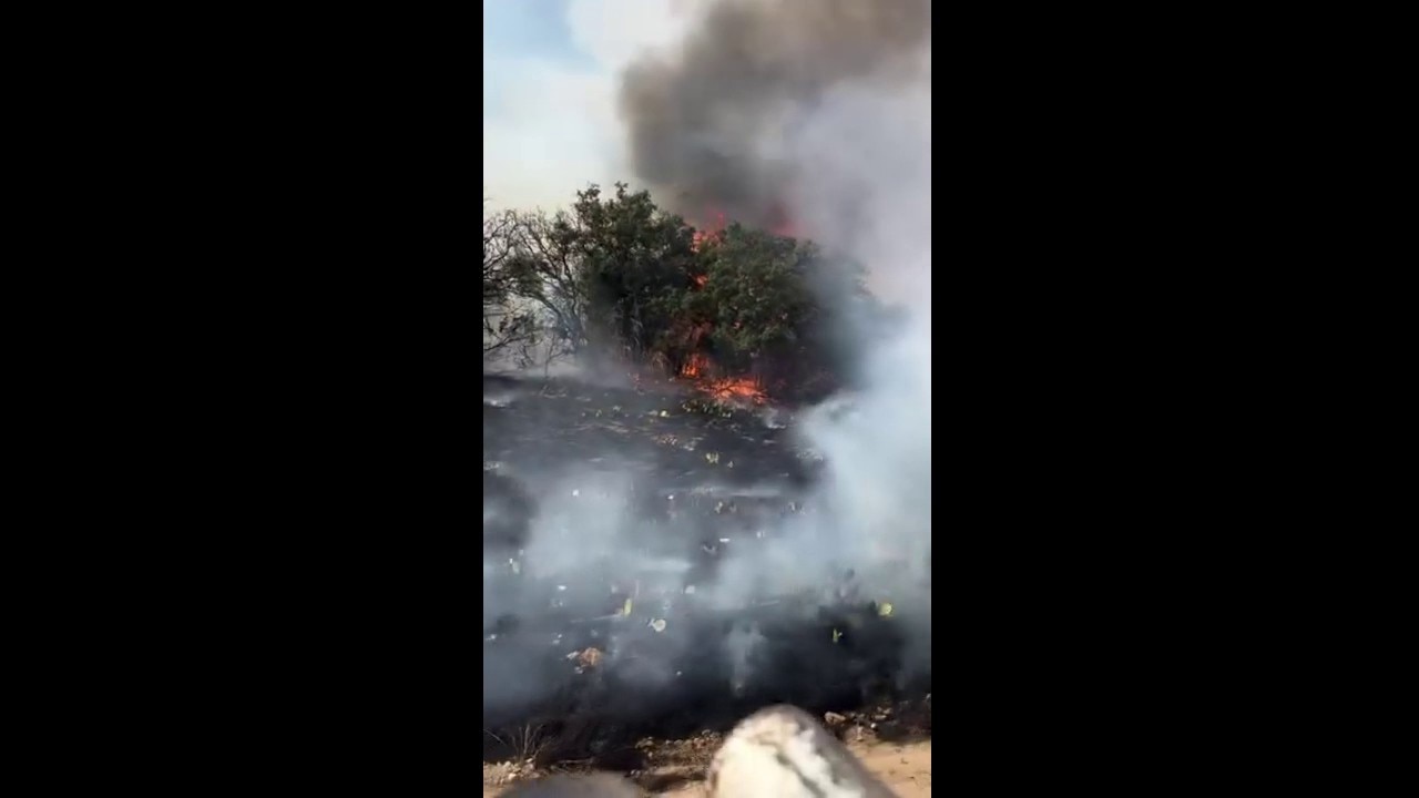 Firefighters battle active 8,700-acre Dry River wildfire in Sutton County