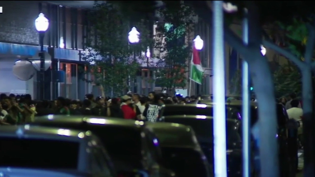 Fans celebrate Mexico's win at San Pedro Square in San Jose