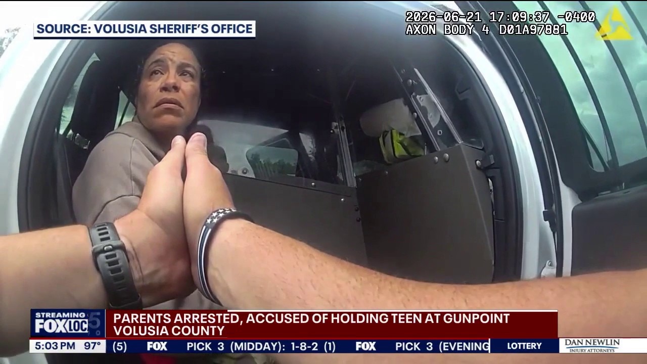Florida parents accused of holding teen at gunpoint 