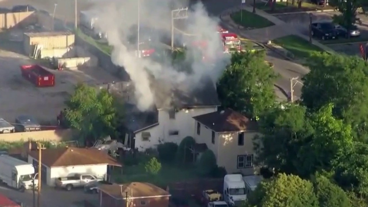 Crews battle house fire in Blue Island