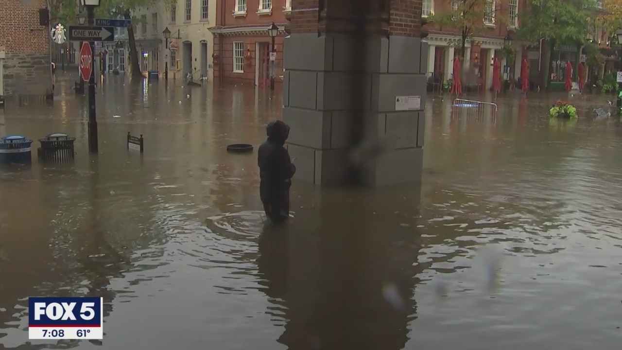 DC-area residents scramble to clean-up after flooding