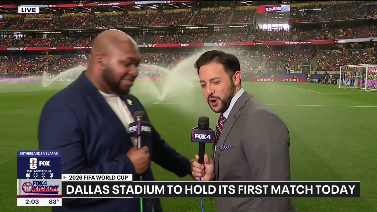 World Cup reporters hit by sprinklers on the field