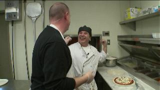 Tony helps prepare pizza at Mozzaluna Pizzeria & Ristorante