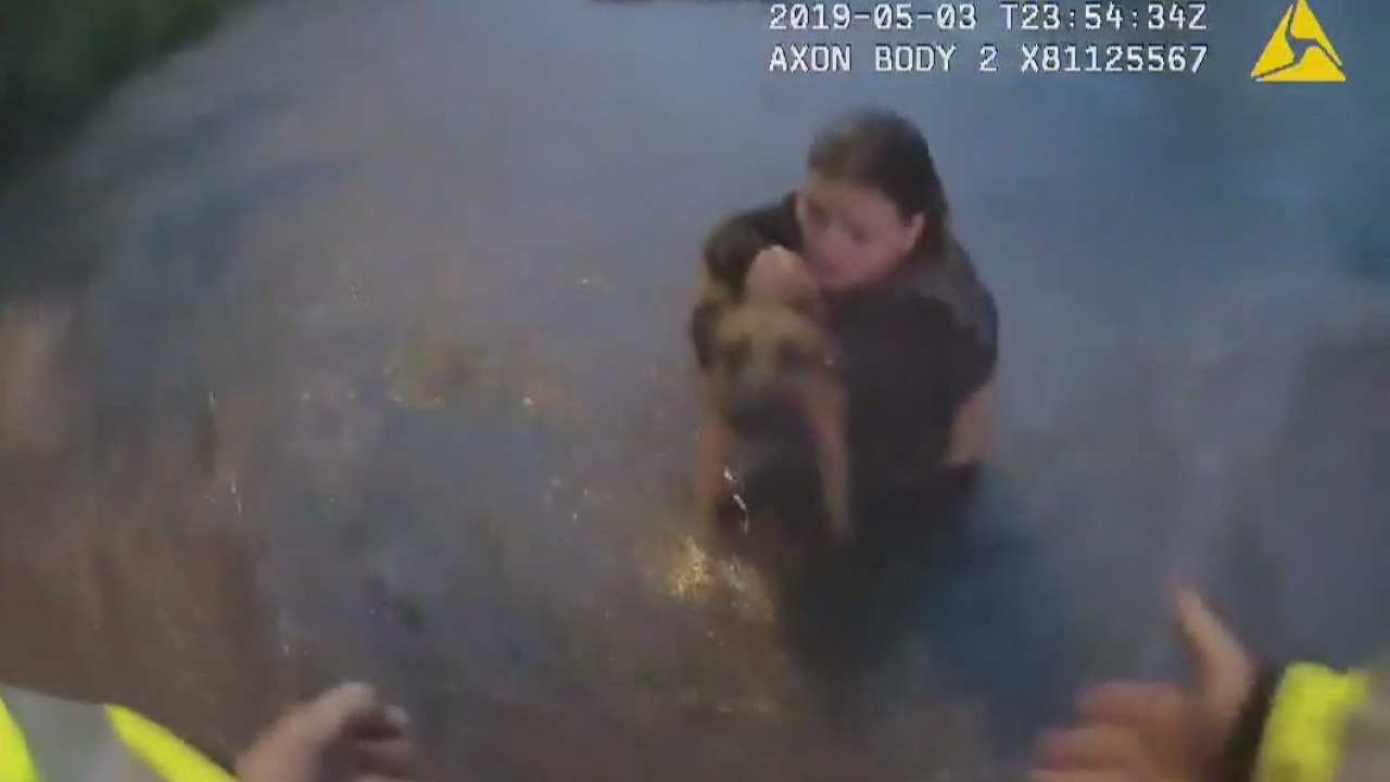 Austin police officers rescue three people, dog