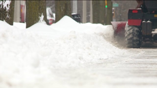 Downtown Milwaukee digs out from first round of snowfall
