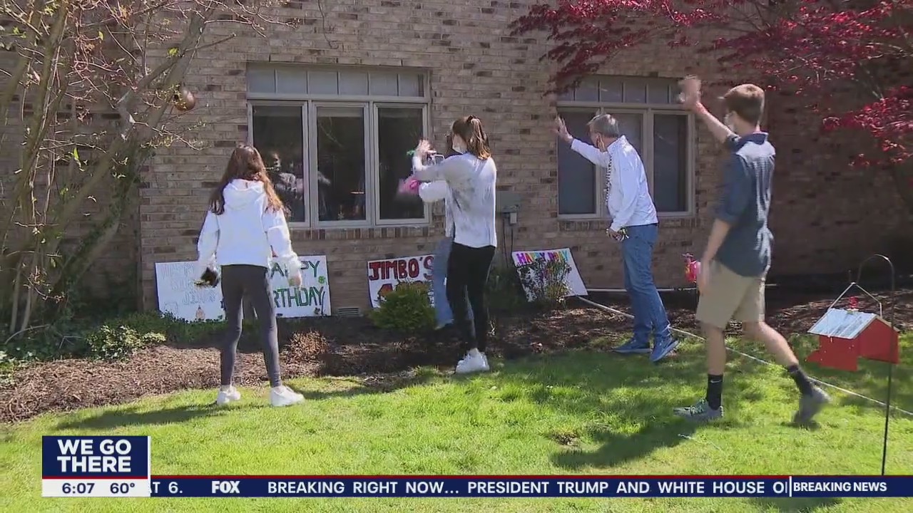 World War II vet celebrates 100th birthday with family through nursing home window